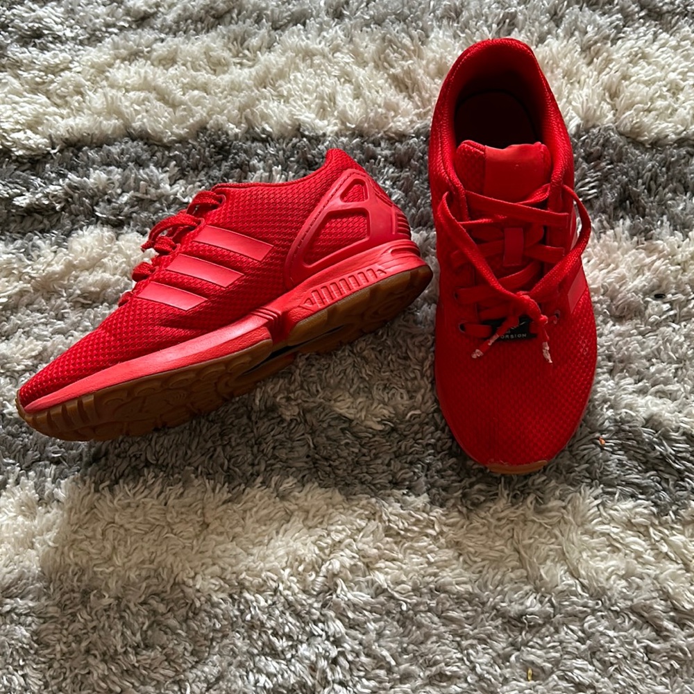 Red adidas sneakers